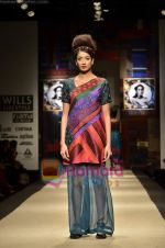 Model walks the ramp for Niki Mahajan show on Wills Lifestyle India Fashion Week 2011-Day 4 in Delhi on 9th April 2011 (85).JPG